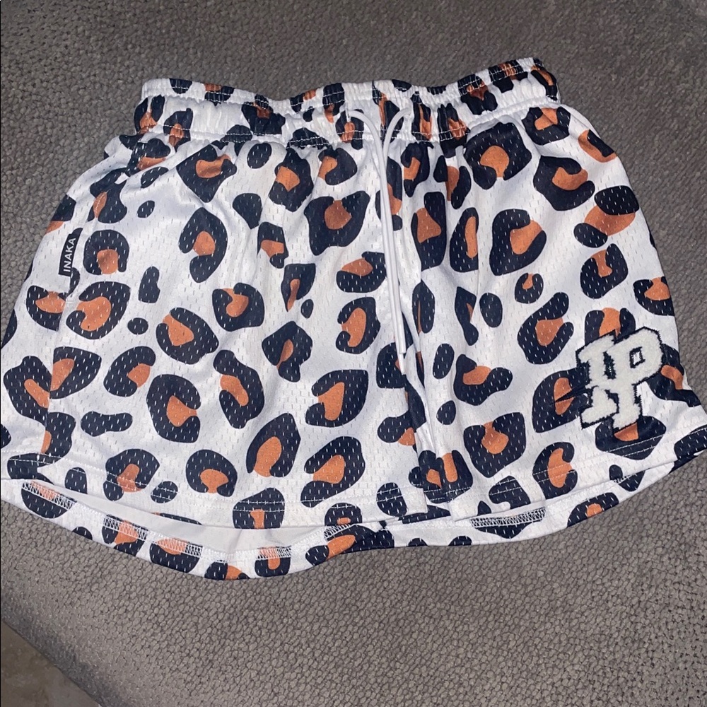 Inaka Power White and Orange Leopard Athletic Shorts